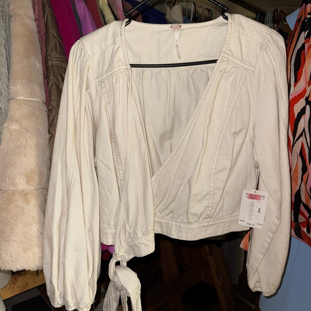 Free People size small new with tags  Elegant White Wrap Top